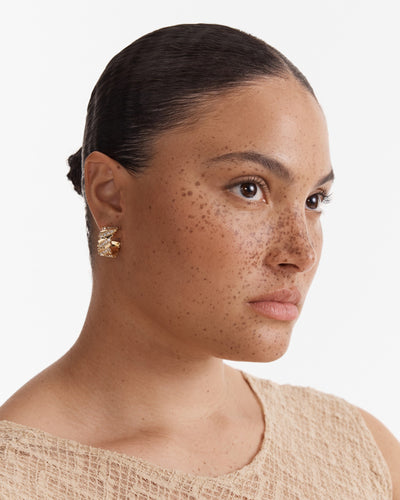 Winked Huggie Hoop Earrings - Gold