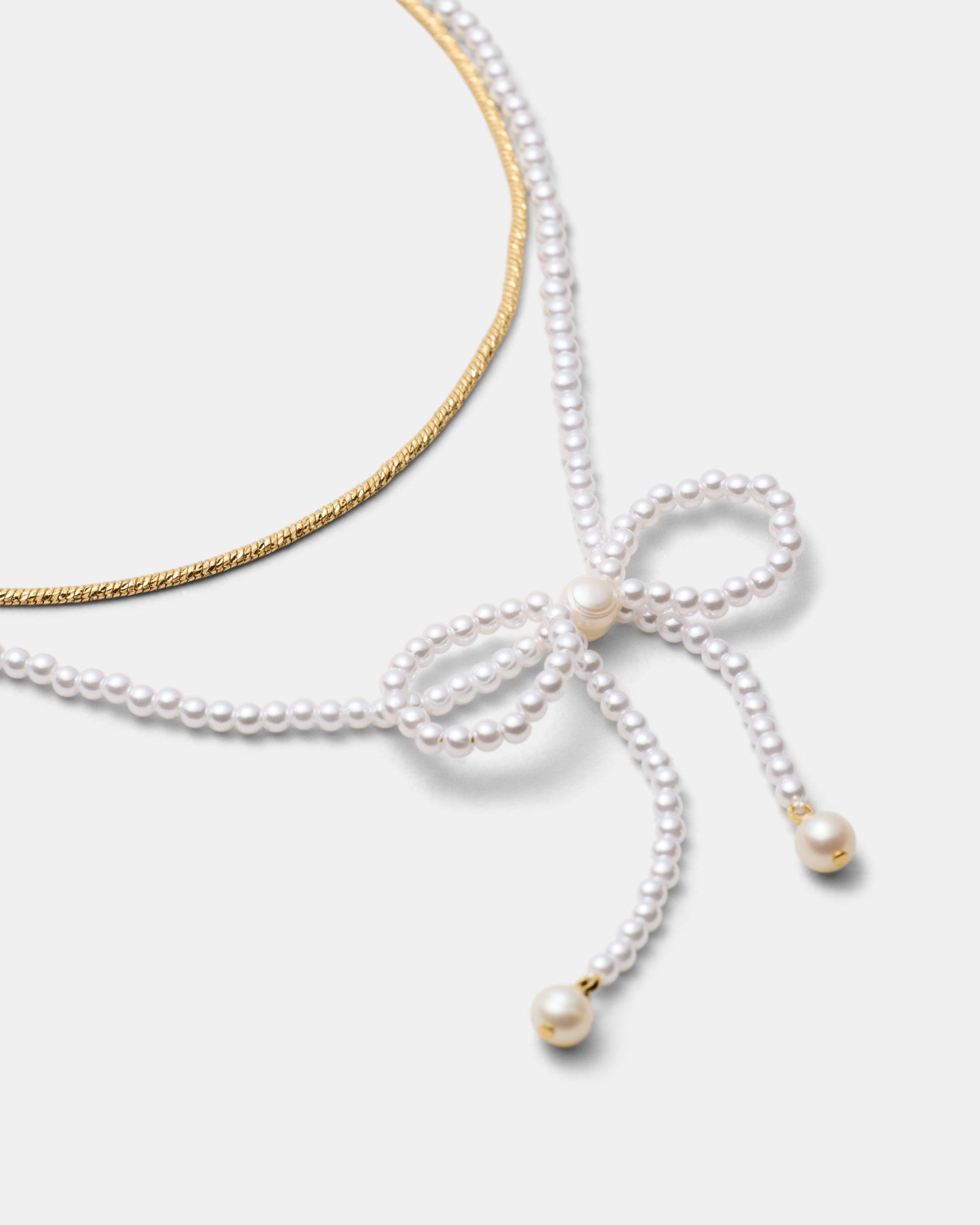Glimmer Bow Necklace - Pearl